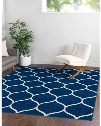Geometric rounded trellis frieze rug (square oval & octagon)